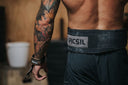 Picsil Athlete doing Wall Climb Crossfit